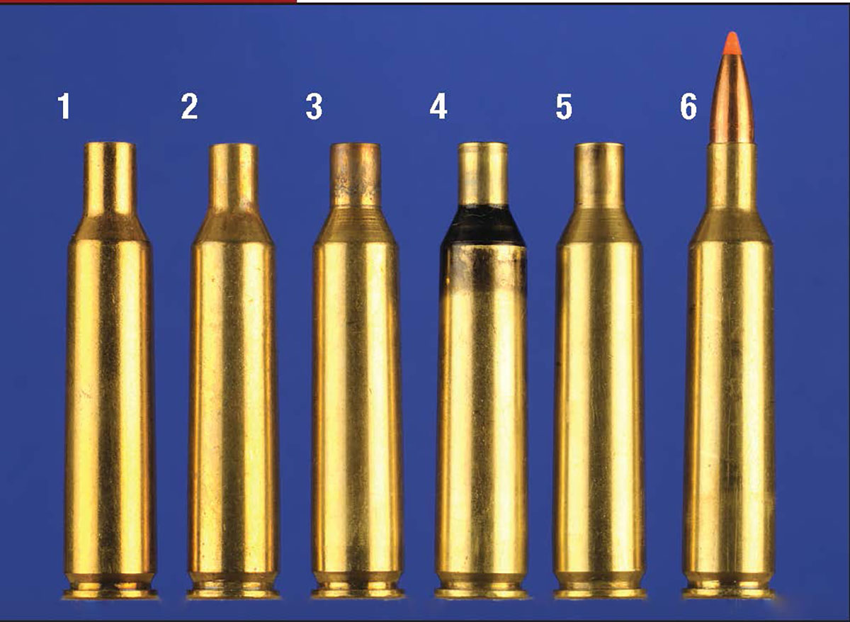 Forming brass for the 224 Texas Trophy Hunter, left to right: 1) 6mm Remington case, 2) necked down to .224 inch, 3) fireformed case, 4) neck sized only, 5) cleaned for loading, 6) loaded cartridge.